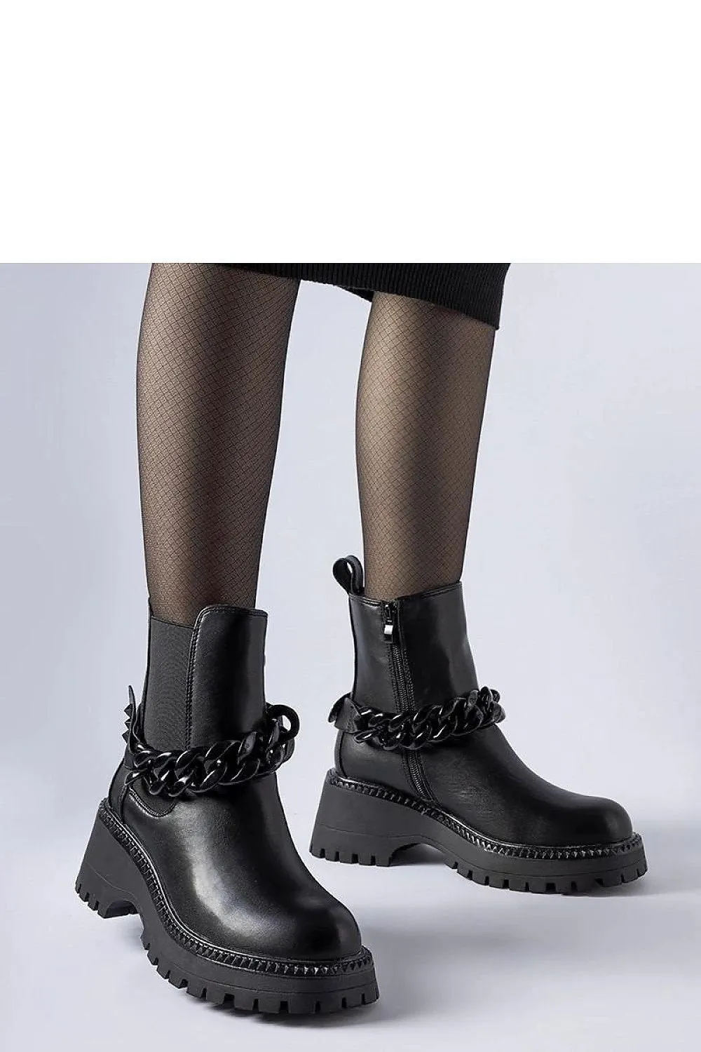 Black ankle boots with a massive sole