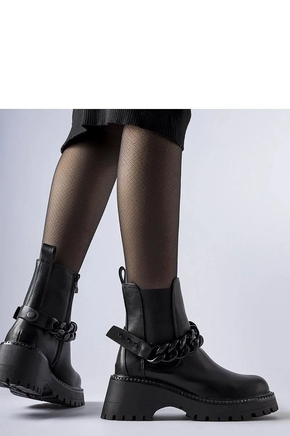 Black ankle boots with a massive sole
