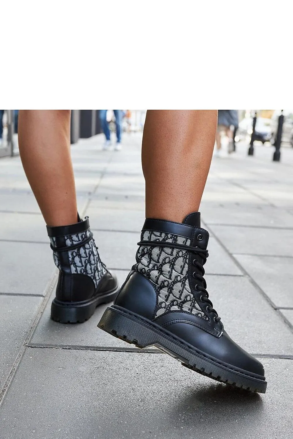 Black trappers decorated with the monogram