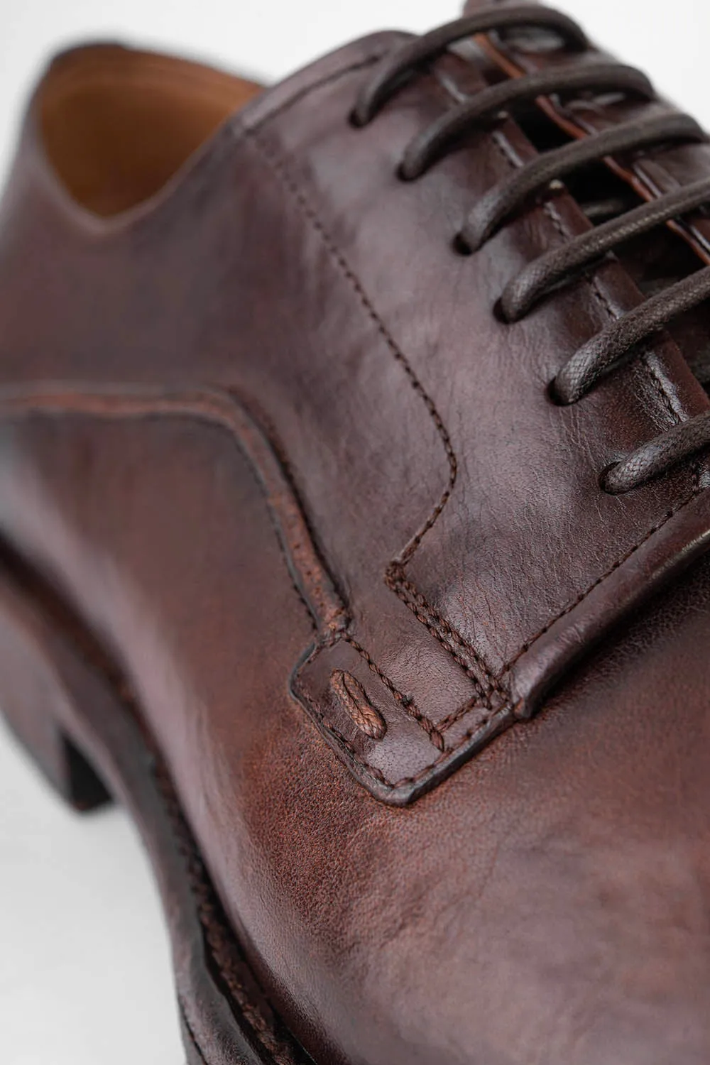 EYTON raw-timber derby shoes.