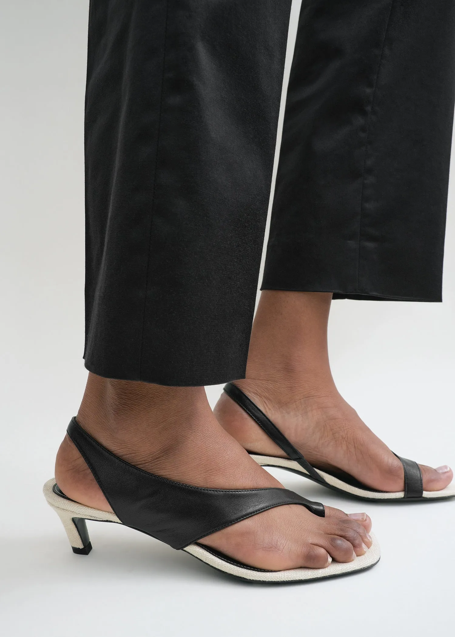 Leather heeled thong sandals black/sand