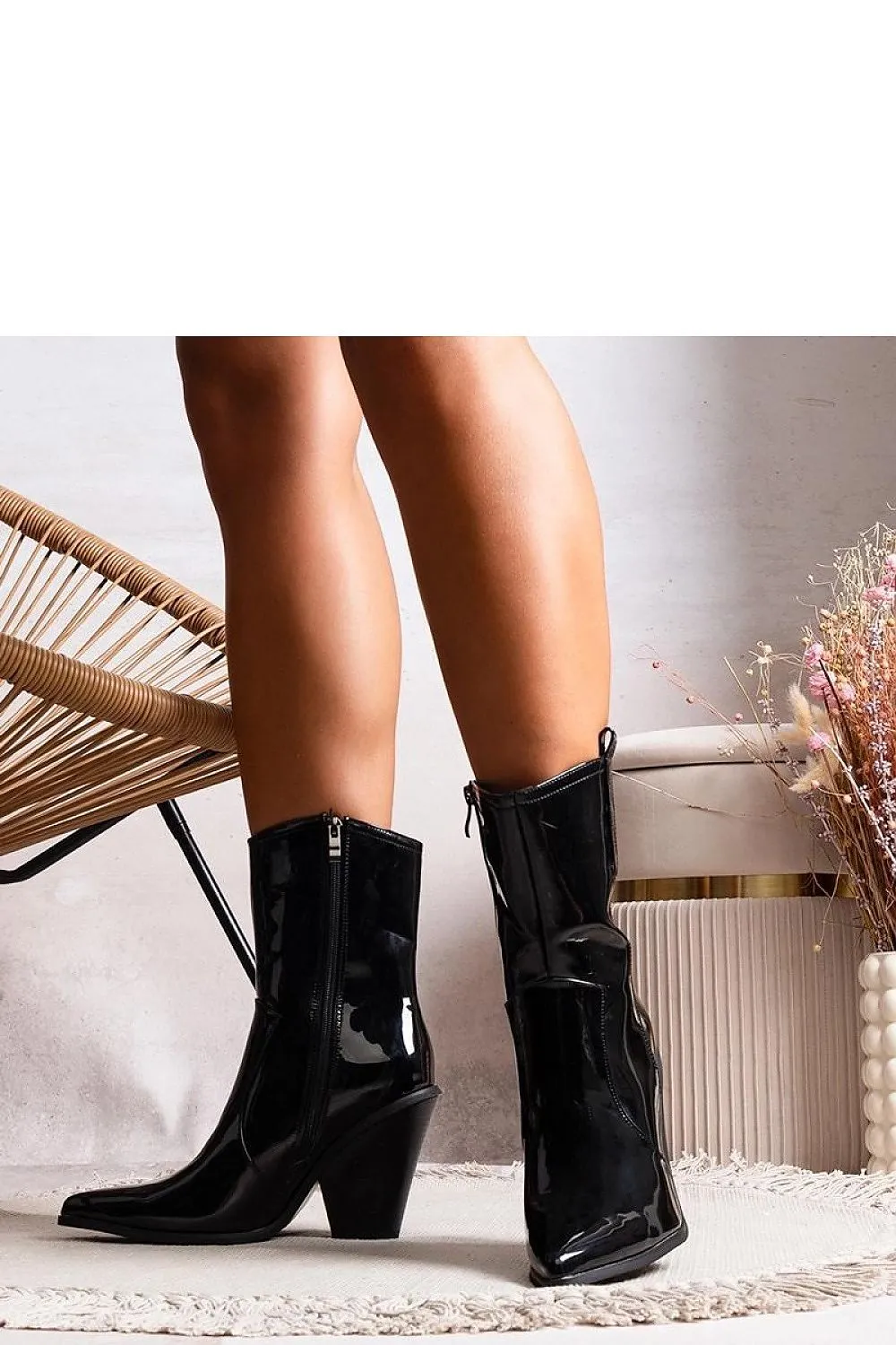 Stylish black lacquered heel boots