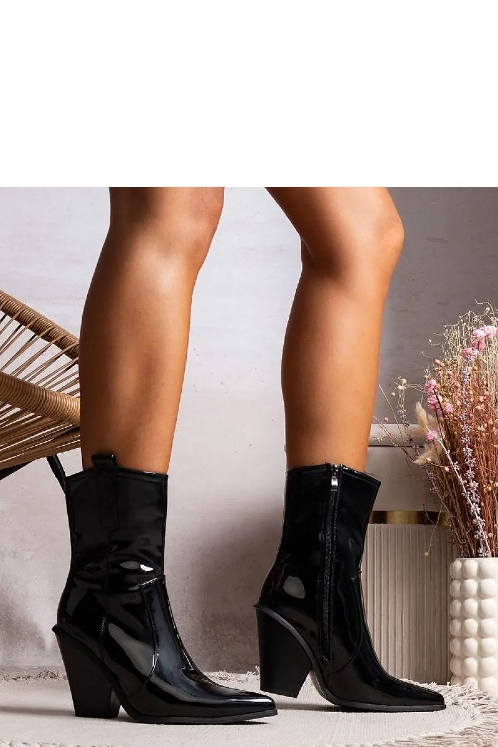 Stylish black lacquered heel boots